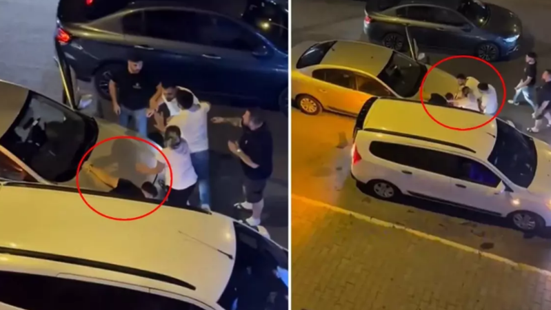 Sürücü mübahisə etdiyi şəxsi iki maşının arasında sıxışdırıb döydü! (Video İzlə)
