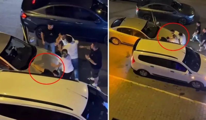 Sürücü mübahisə etdiyi şəxsi iki maşının arasında sıxışdırıb döydü! (Video İzlə)